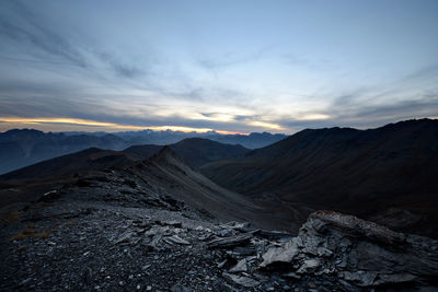 Scenic view of mountains against sky during sunset