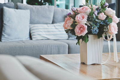 Close-up of vase on table at home