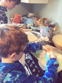 High angle view of boy playing with toy