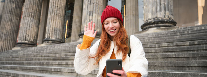 Young woman using mobile phone