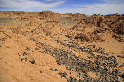 Scenic view of desert against sky