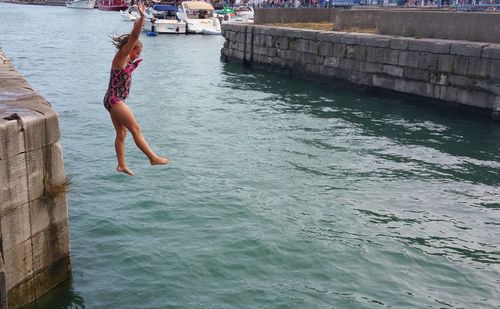 Man jumping in sea