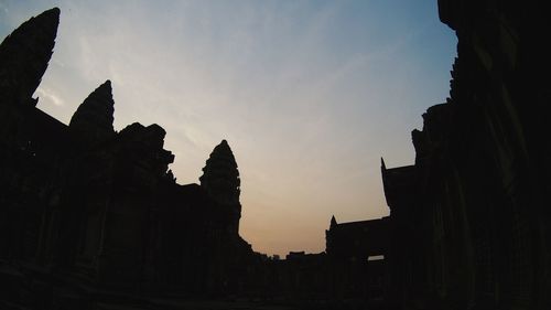 Silhouette of buildings against sky