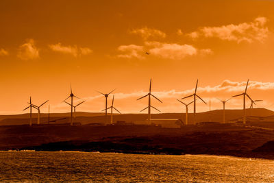 Landscape with wind turbines that produce electricity by rotating in the wind. wind farm eolic park