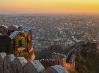High angle view of townscape against sky during sunset