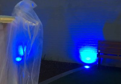 Close-up of blue light at night