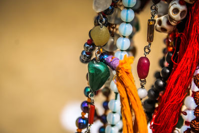 Close-up of beads hanging for sale