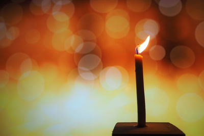 Close-up of burning candle