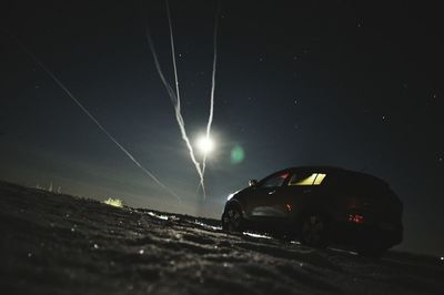 Car against sky at night