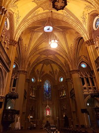 Low angle view of illuminated ceiling of building