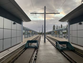 Railroad station platform against sky