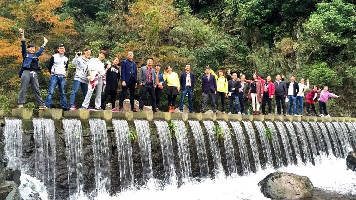 water, tree, lifestyles, leisure activity, person, men, standing, reflection, day, large group of people, in a row, outdoors, lake, nature, tourist, green color, river, vacations, casual clothing