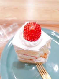 Close-up of strawberry cake in plate