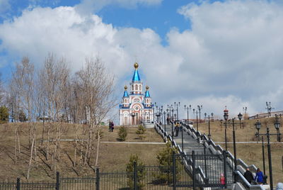 View of building against cloudy sky