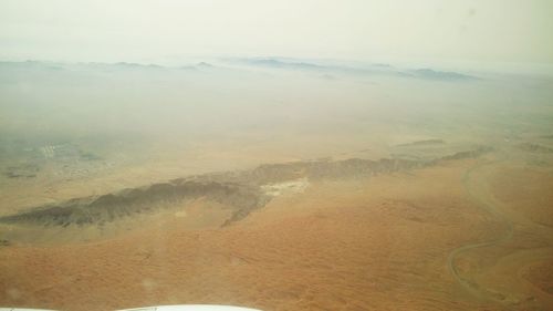 Aerial view of landscape against sky