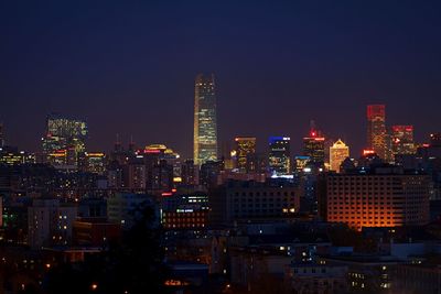 Illuminated cityscape at night