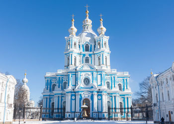 Low angle view of building against blue sky