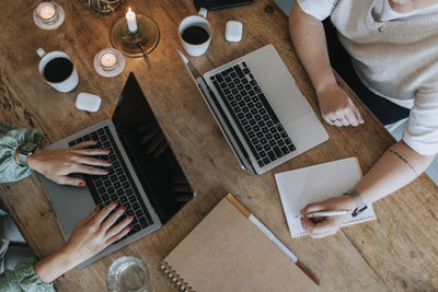 Women hands using laptops