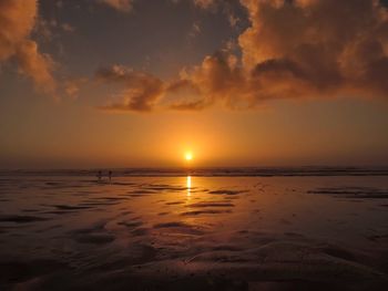 Scenic view of sea at sunset