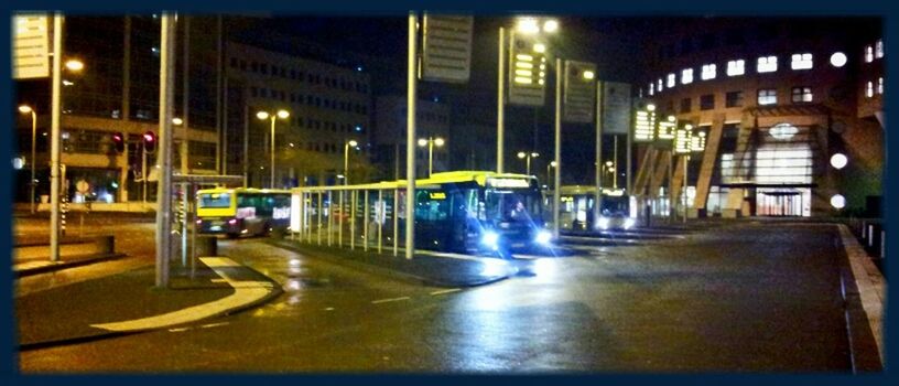 illuminated, night, transportation, architecture, built structure, building exterior, city, street, mode of transport, motion, road, lighting equipment, long exposure, land vehicle, light - natural phenomenon, blurred motion, city life, car, street light, city street