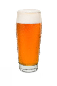 Close-up of beer glass against white background