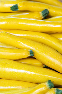 Full frame shot of bright yellow vegetables in market