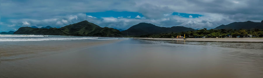 Panoramic view of beach against sky