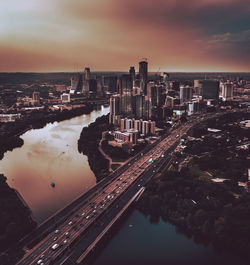 High angle view of city at sunset