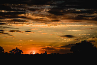 Scenic view of dramatic sky during sunset