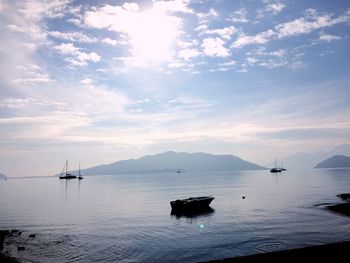 Boats sailing in sea