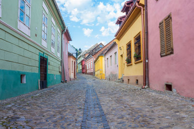 Narrow alley along buildings