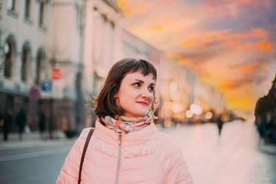 Portrait of young woman looking away