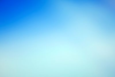 Defocused image of clear blue sky