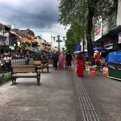 People at town square against sky