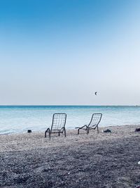 Scenic view of sea against clear blue sky