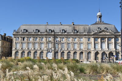 Exterior of historic building against clear blue sky