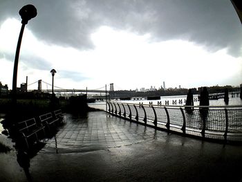 View of street light against cloudy sky