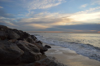 Scenic view of sea against sky during sunset