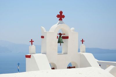 View of bell tower against blue sky