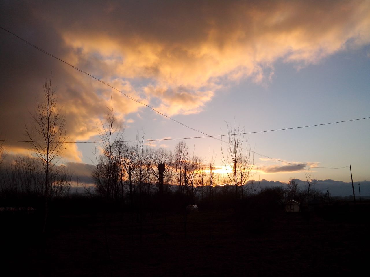 sunset, electricity pylon, sky, power line, silhouette, electricity, power supply, cloud - sky, tranquility, fuel and power generation, landscape, scenics, tranquil scene, beauty in nature, orange color, nature, field, cable, cloud, connection