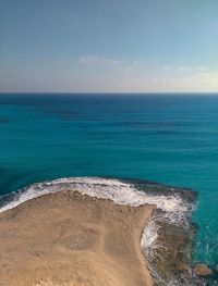 The mediterranean sea waves on a beach