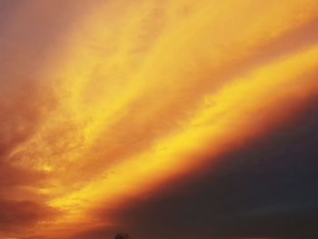 Low angle view of orange cloudy sky