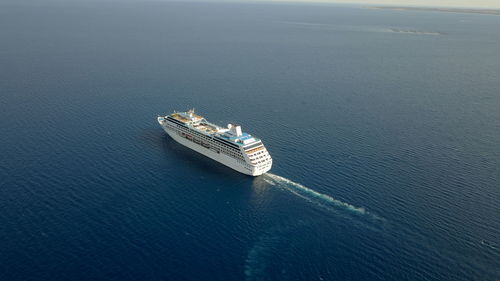 High angle view of ship sailing in sea