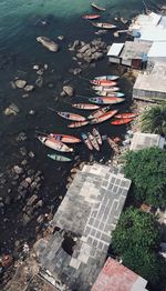 High angle view of harbor by buildings in city