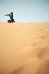 Scenic view of desert against sky