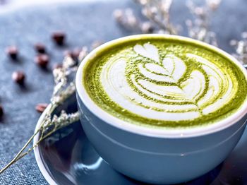 Close-up of matcha latte on table