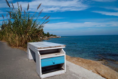 Scenic view of sea against blue sky