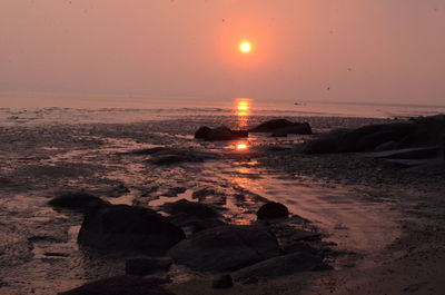 Scenic view of sea during sunset