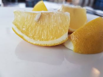 Close-up of lemon slice in plate