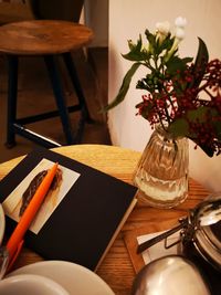 High angle view of wine in glass on table